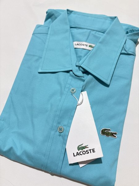 قميص لاكوست باللون الازرق